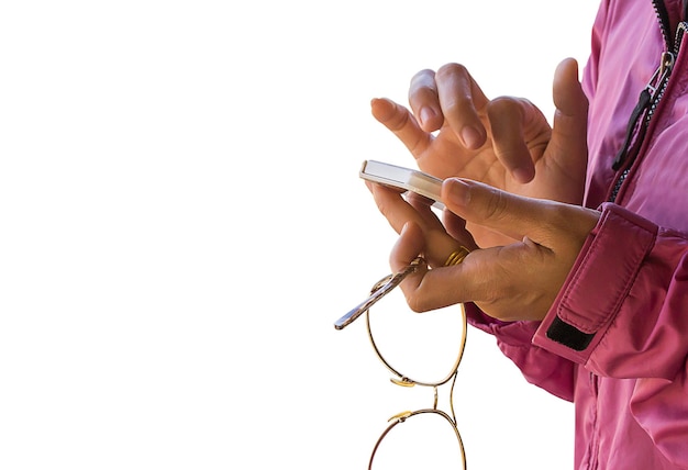 Female hand holding smart phone on white background