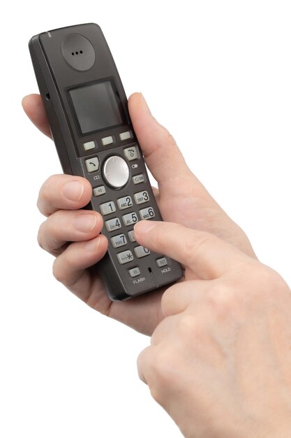 Female hand holds a phone isolated on white background