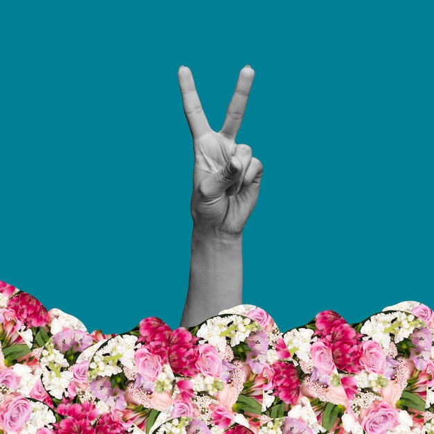 Female hand showing peace gesture on teal blue color background trendy abstact collage with flowers