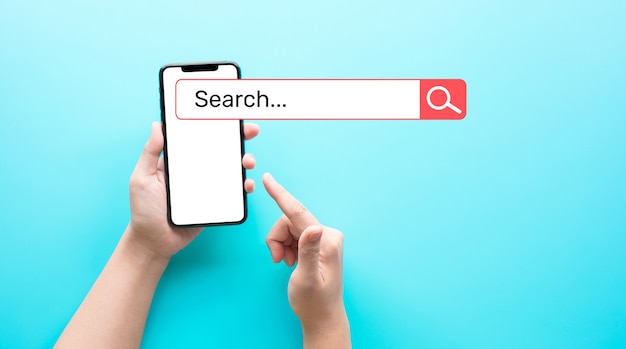 female hand showing smartphone with blank screen