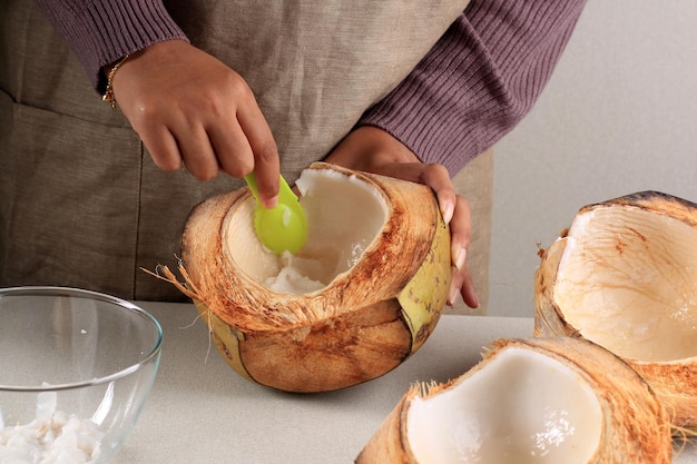 Female Hand Shredded Young Coconut Meat