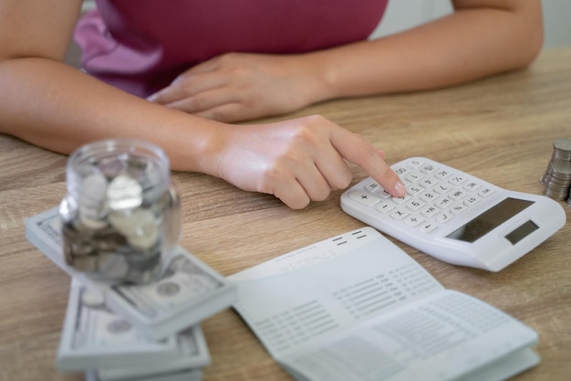 Female hand stack coins growing business Saving money financial or loan for prepare in future financial insurance concept