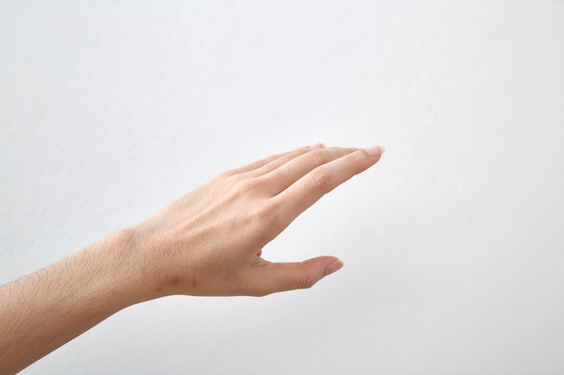 Female hand on white background