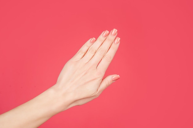 Female hand with manicure and smooth skin