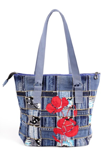 Female handmade bag of denim with floral pattern