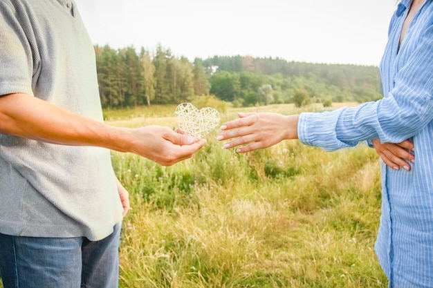 Female hands giving heart love friendship