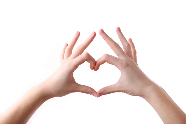 Female hands in heart shape 