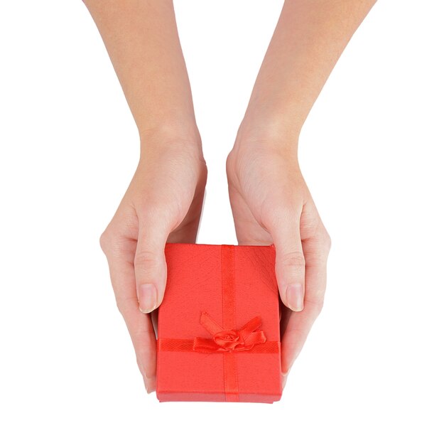 Female hands holding gift box, closeup