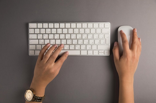 Female hands on the keyboard