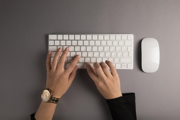 Female hands on the keyboard