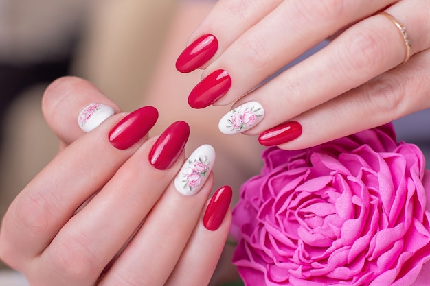 Female hands with pink manicure