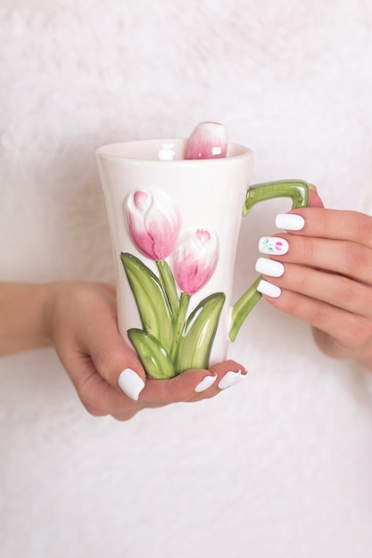 Female hands with spring manicure nails