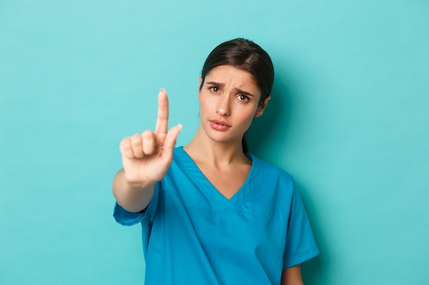 Female healthcare worker posing