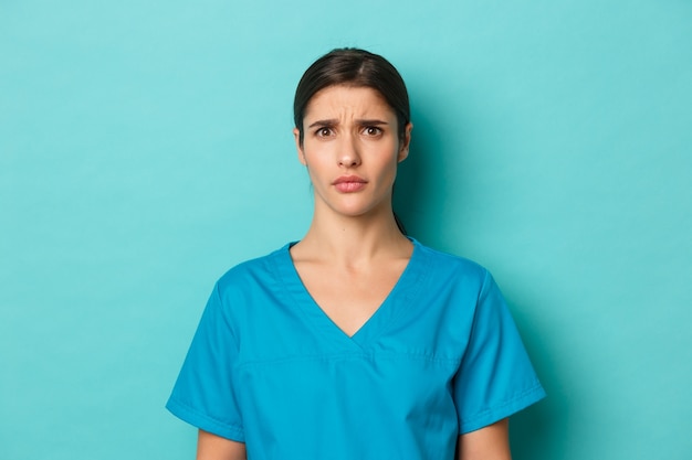 Female healthcare worker posing