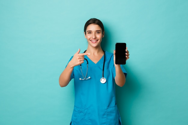 Female healthcare worker posing