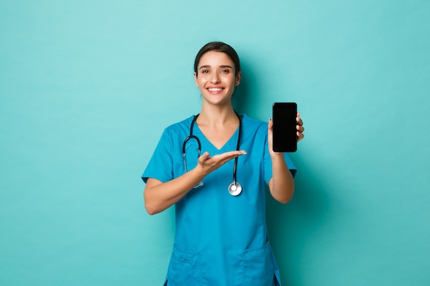 Female healthcare worker posing