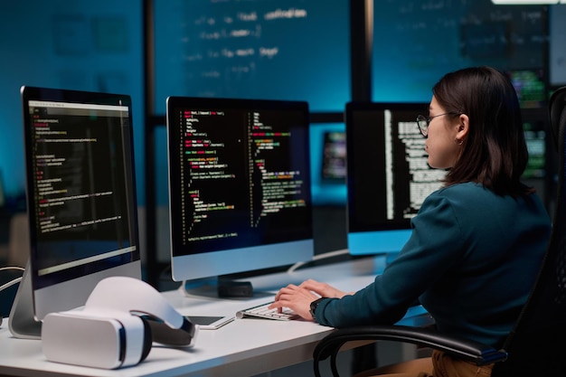 female it developer writing code for vr
