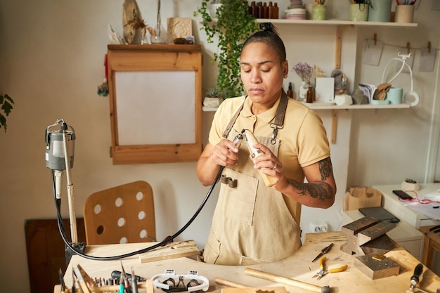 Female jeweler working on new creations