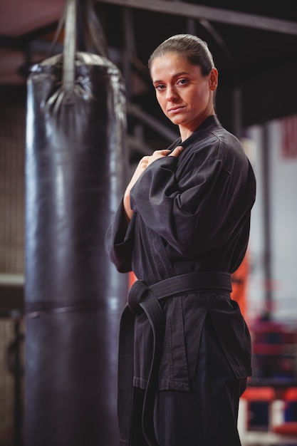 Female karate player performing karate stance