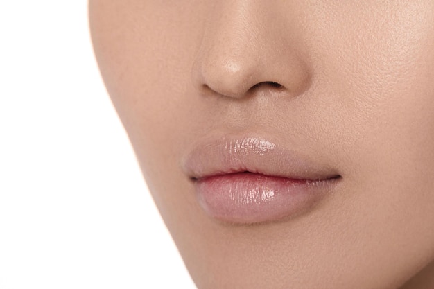 Female lips after augmentation procedure clean skin