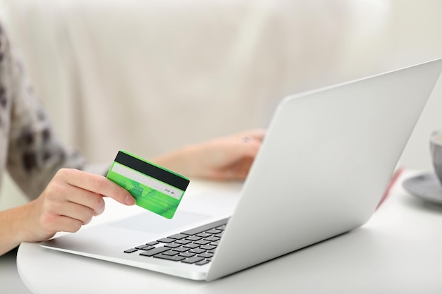 Female making online payment close up
