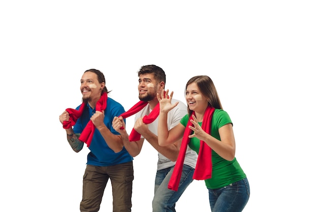 Female and male soccer fans cheering for favourite sport team with bright emotions