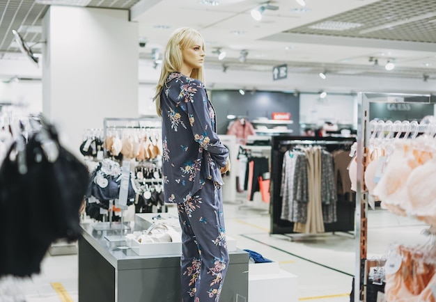 Female mannequin in home pajamas in a lingerie store holiday shopping