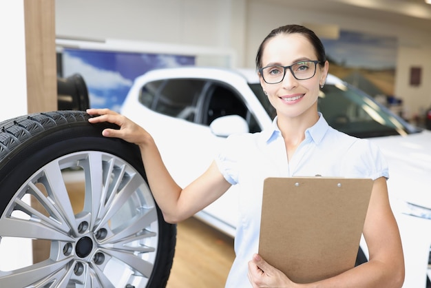 Female marketer making presentation of new tires