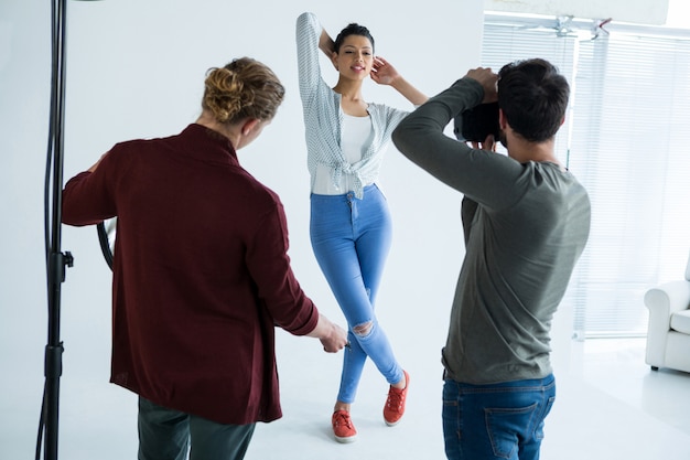 Female model posing for photographer