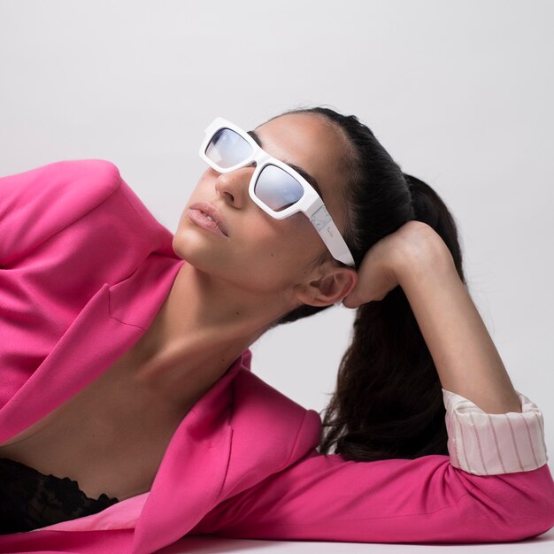 female model posing on a white