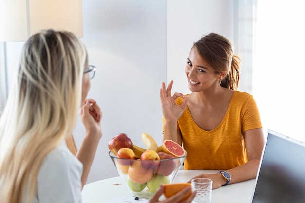 Female nutritionist giving consultation to patient Making diet plan in weight loss clinic