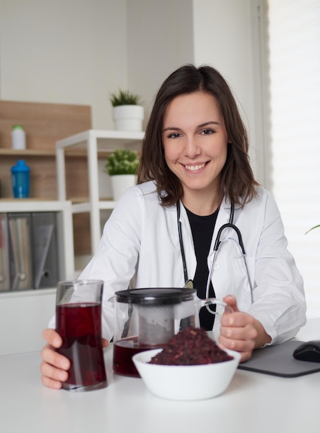 Female nutritionist talking about hibiscus drink infusion tea