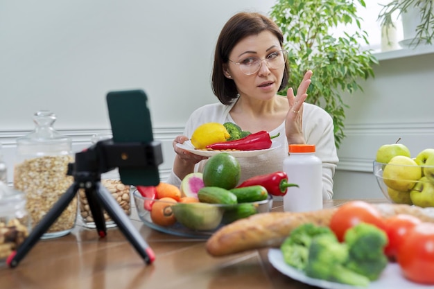 Female nutritionist telling her followers about healthy food nutritional supplements