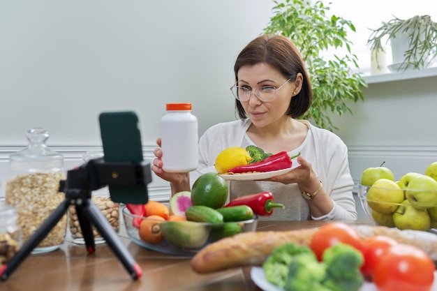 Female nutritionist telling her followers about healthy food nutritional supplements