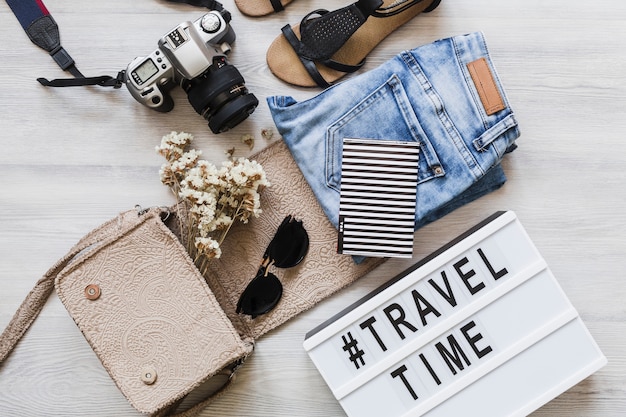 Female outfits and accessories with travel and time text