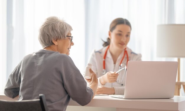 Female patient listening to a doctor in hospital