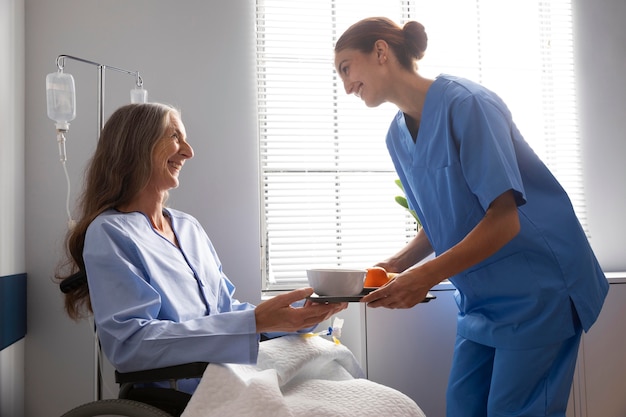 Female patient in wheelchair indoors