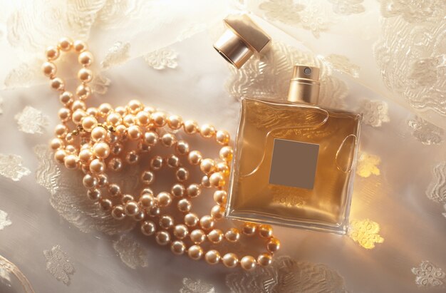 Female perfume with pearls