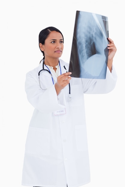 Female physician checking xray