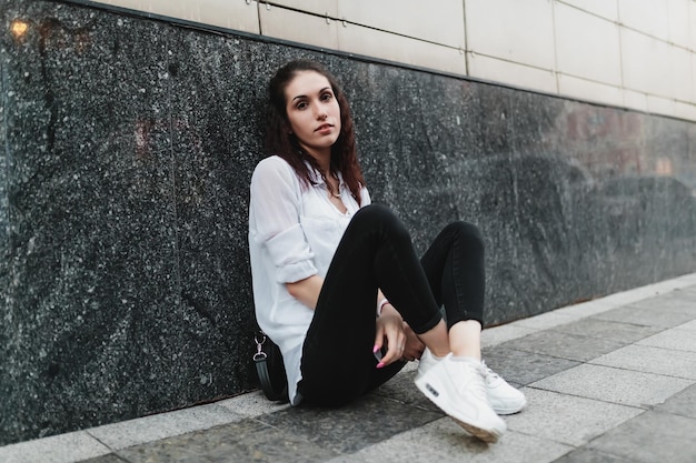 Female portrait in a neon city high quality photo