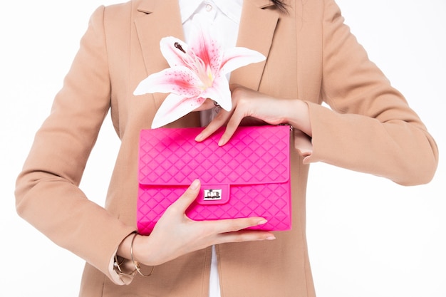 Female posing with pink purse