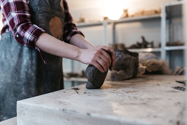 Female potter at work