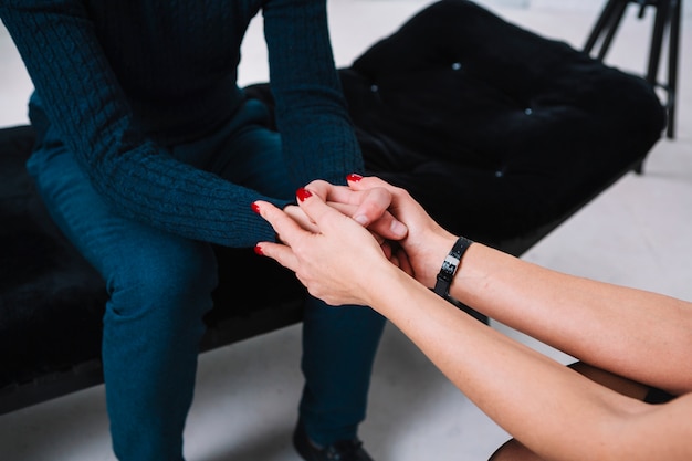 Female psychologist supporting or comforting her patient