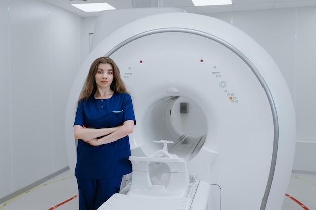 A female radiologist against the background of a modern CT scanner Medical Diagnostic Center