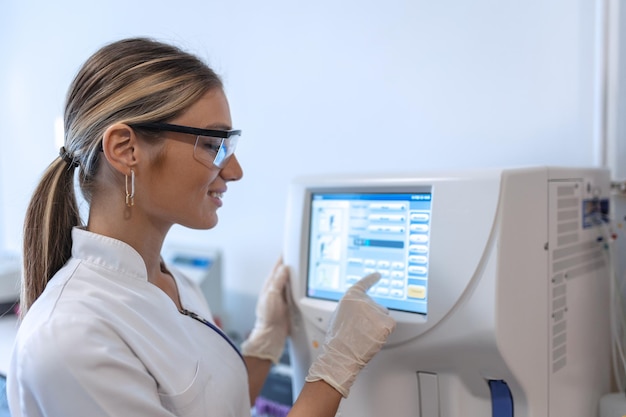 Female science intern analyzing DNA RNA or blood samples for drug use results disease and virus research