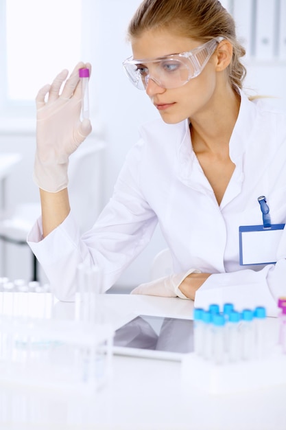 Female scientific researcher in laboratory. Medicine and health care concept
