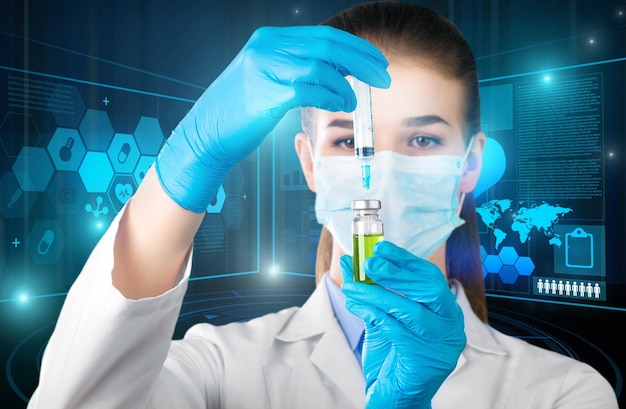 Female scientist holding syringe and bottle