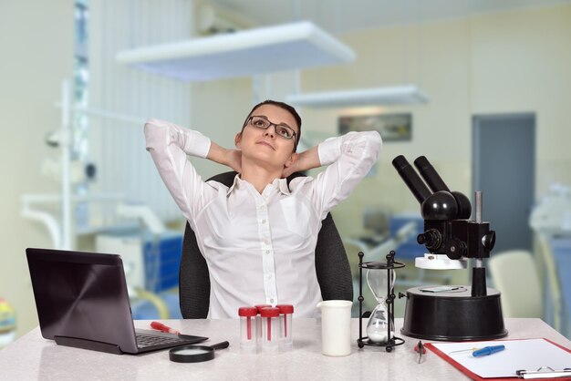 Female scientist thinking