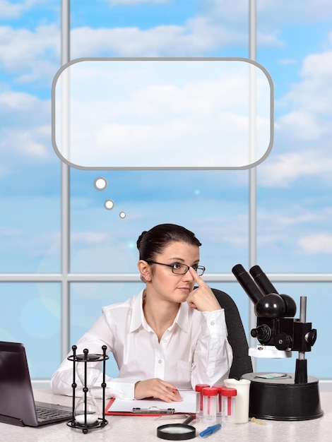 Female scientist thinking