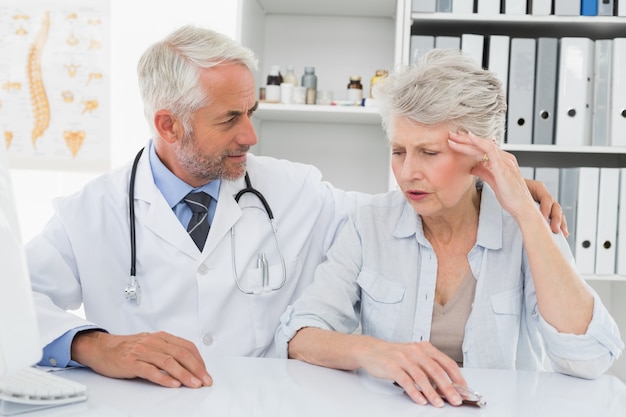 Female senior patient visiting doctor